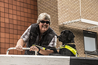 Guide Dog Oakley and "Mum" working a lock.